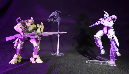The HG Chuchu's Demi Trainer and the HG Michaelis posed facing each other