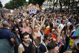 Tens of thousands rally against transphobia at Paris Pride March