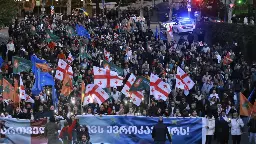 Tens of thousands of pro-EU supporters rally in Georgia ahead of key vote